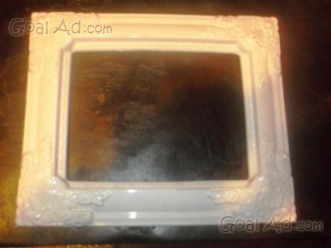 Antica cornice in porcellana